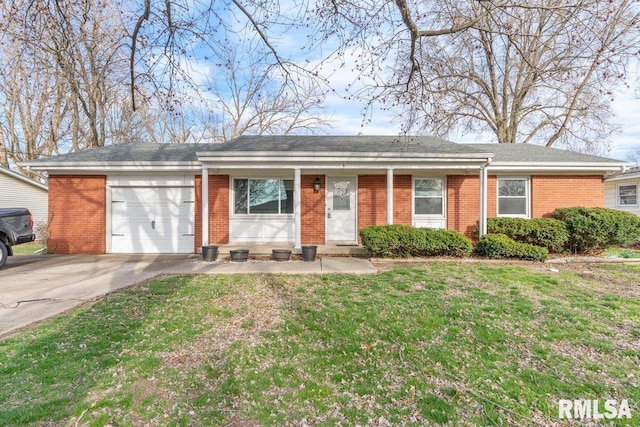ranch-style home featuring brick siding, a front yard, driveway, and a garage