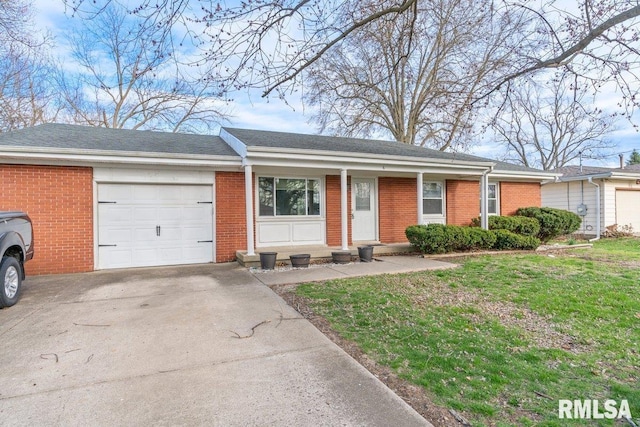 ranch-style house with an attached garage, driveway, a front lawn, and brick siding