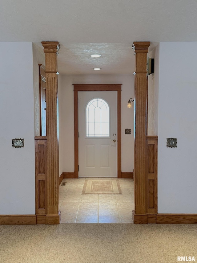 290 W Railroad St, Roseville, IL 61473 - entryway with baseboards, visible vents, and light carpet