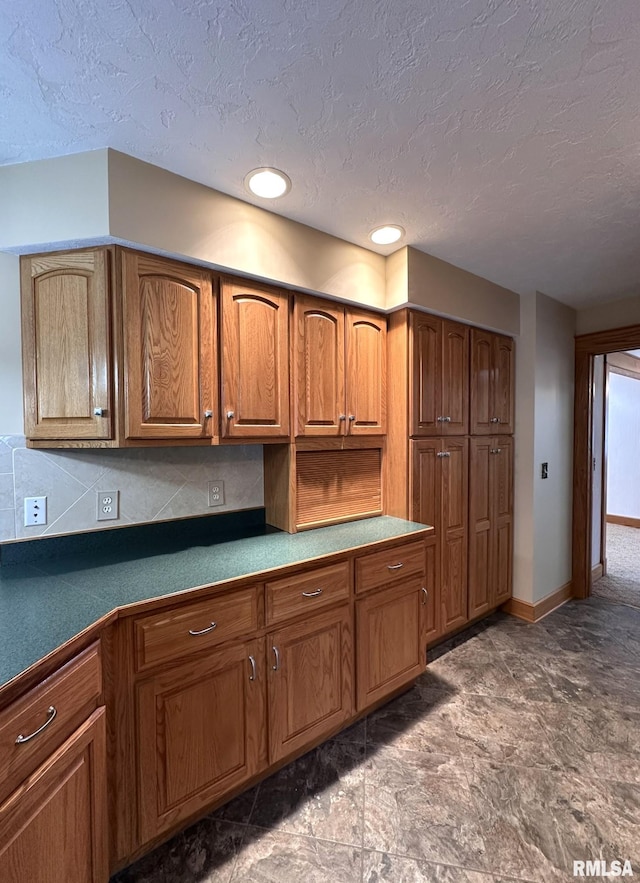 290 W Railroad St, Roseville, IL 61473 - kitchen with brown cabinets, decorative backsplash, baseboards, and a textured ceiling