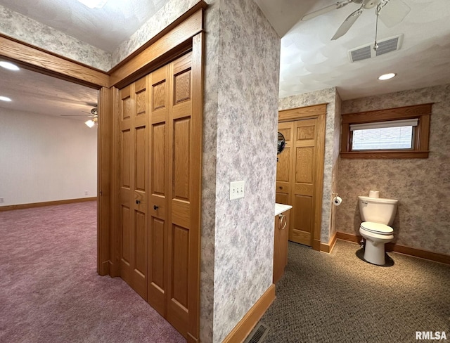 290 W Railroad St, Roseville, IL 61473 - hall featuring baseboards, visible vents, wallpapered walls, and dark carpet