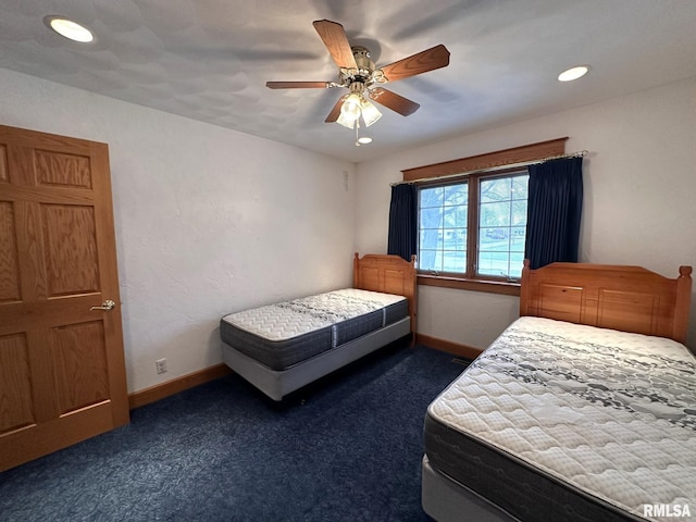 290 W Railroad St, Roseville, IL 61473 - bedroom featuring baseboards, ceiling fan, and dark carpet