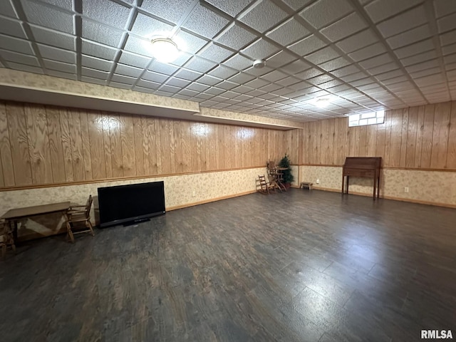 290 W Railroad St, Roseville, IL 61473 - basement with wooden walls, wood finished floors, baseboards, wallpapered walls, and a paneled ceiling