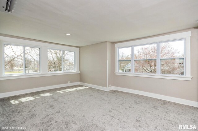 418 4th St, Illiopolis, IL 62539 - unfurnished room with carpet flooring, baseboards, and recessed lighting