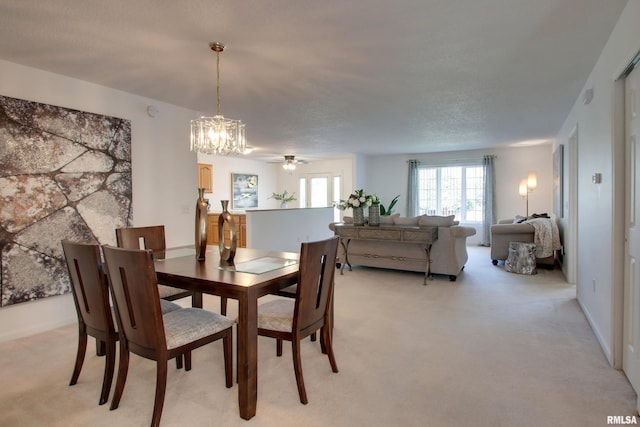4804 Elm St, Quincy, IL 62305 - dining area with light colored carpet and a chandelier