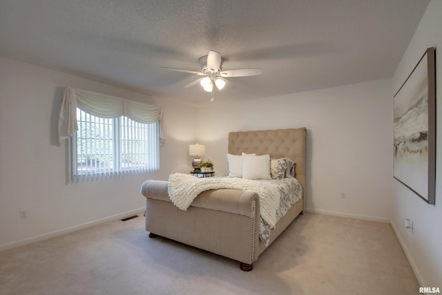 4804 Elm St, Quincy, IL 62305 - bedroom featuring light colored carpet, a ceiling fan, and baseboards
