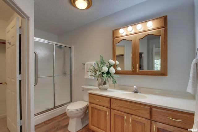 4804 Elm St, Quincy, IL 62305 - full bath featuring a shower stall, vanity, toilet, and wood finished floors