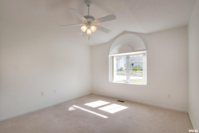 4804 Elm St, Quincy, IL 62305 - carpeted empty room with vaulted ceiling, ceiling fan, and baseboards