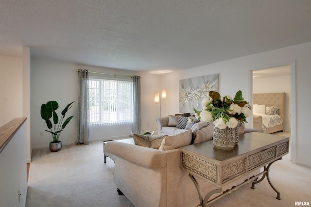 4804 Elm St, Quincy, IL 62305 - carpeted living room featuring a textured ceiling and baseboards