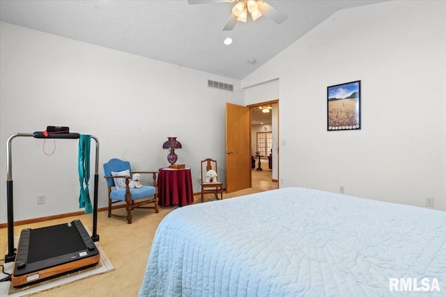 bedroom with visible vents, baseboards, a ceiling fan, light carpet, and vaulted ceiling