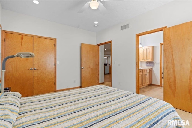 bedroom featuring ensuite bathroom, recessed lighting, visible vents, and a closet