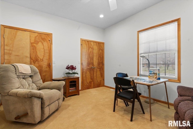 office area featuring light carpet, baseboards, ceiling fan, and recessed lighting