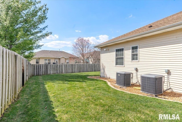 view of yard featuring a fenced backyard and cooling unit