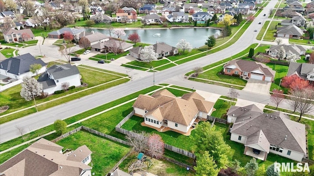 aerial view with a water view and a residential view