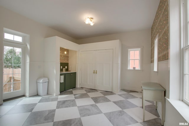 1477 Maine St, Quincy, IL 62301 - entrance foyer featuring baseboards and light floors