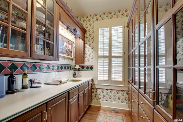 1477 Maine St, Quincy, IL 62301 - interior space with wallpapered walls, a sink, and a healthy amount of sunlight