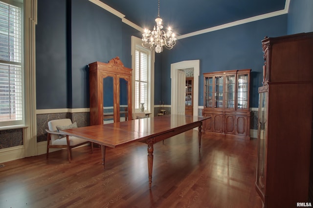 1477 Maine St, Quincy, IL 62301 - unfurnished dining area with an inviting chandelier, wainscoting, ornamental molding, and wood finished floors