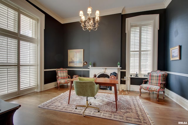 1477 Maine St, Quincy, IL 62301 - interior space with baseboards, a notable chandelier, wood finished floors, and ornamental molding