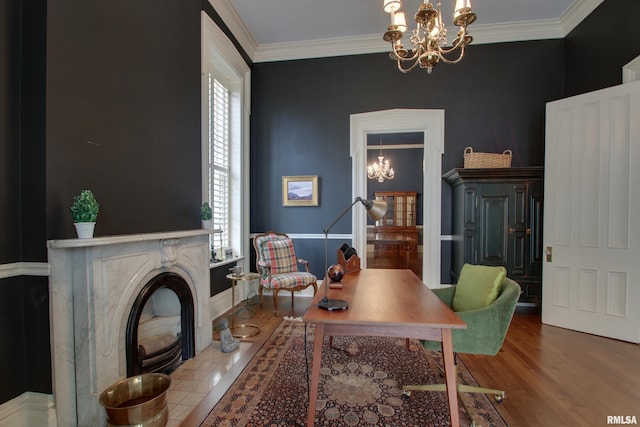 1477 Maine St, Quincy, IL 62301 - office with baseboards, crown molding, wood finished floors, and a chandelier
