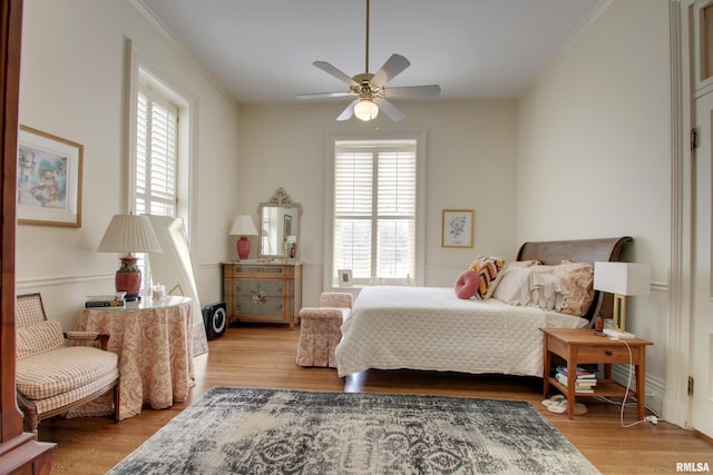 1477 Maine St, Quincy, IL 62301 - bedroom featuring multiple windows, crown molding, and wood finished floors