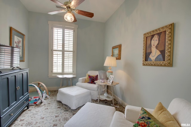 1477 Maine St, Quincy, IL 62301 - living area with baseboards and ceiling fan