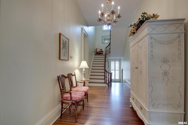 1477 Maine St, Quincy, IL 62301 - entrance foyer with wood finished floors, an inviting chandelier, stairway, and plenty of natural light