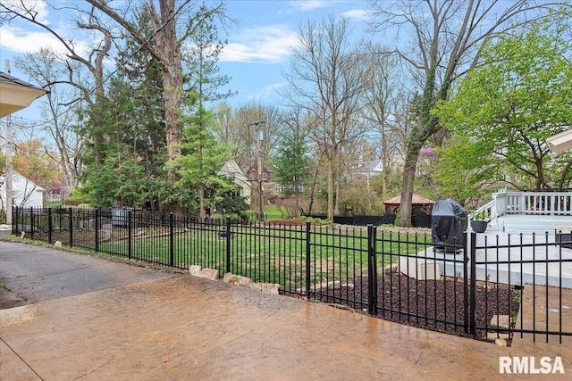 exterior space with a lawn and a fenced front yard