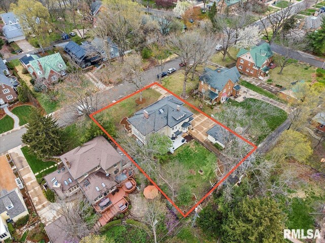 birds eye view of property with a residential view