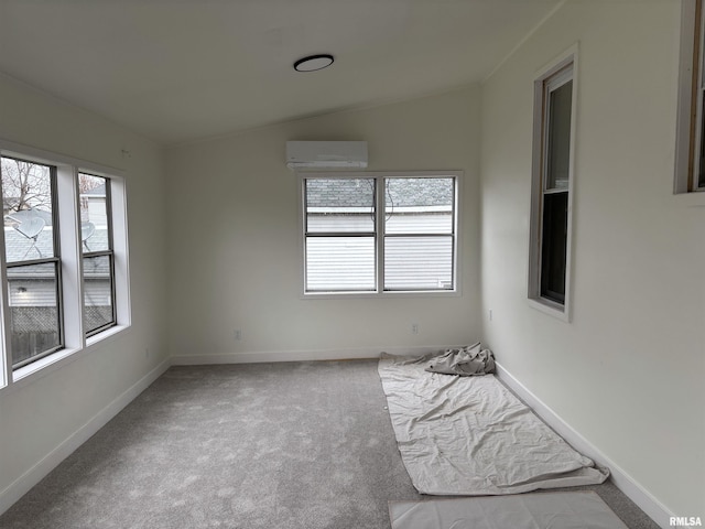 unfurnished sunroom featuring a wall unit AC