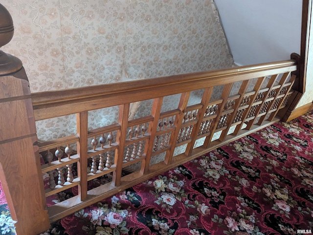 room details featuring wallpapered walls