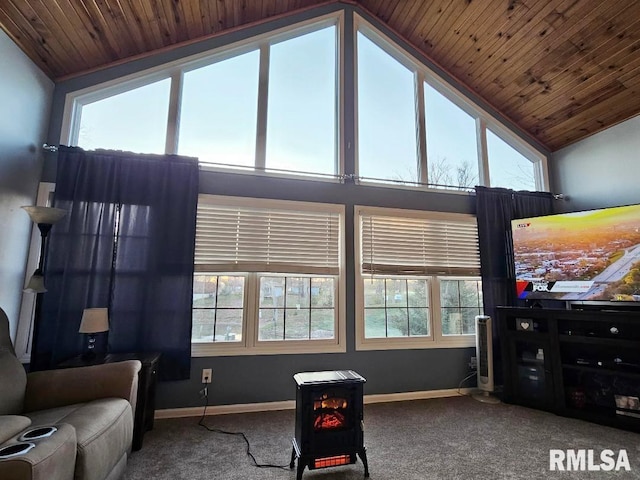 carpeted living room with baseboards, a wealth of natural light, lofted ceiling, and wood ceiling