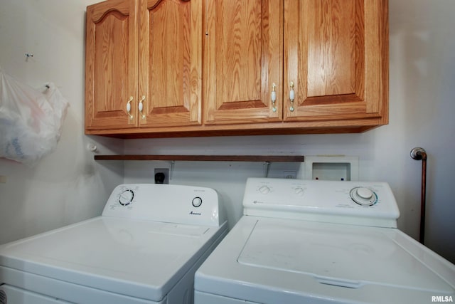 812 N 49th St, Quincy, IL 62305 - laundry room featuring washer and dryer and cabinet space