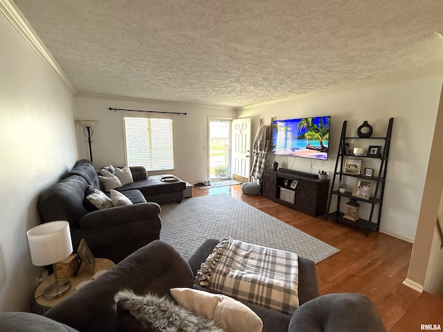 104 W Waterford Dr, Quincy, IL 62305 - living area with ornamental molding, baseboards, wood finished floors, and a textured ceiling