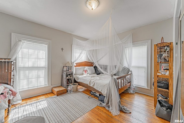 bedroom featuring wood finished floors