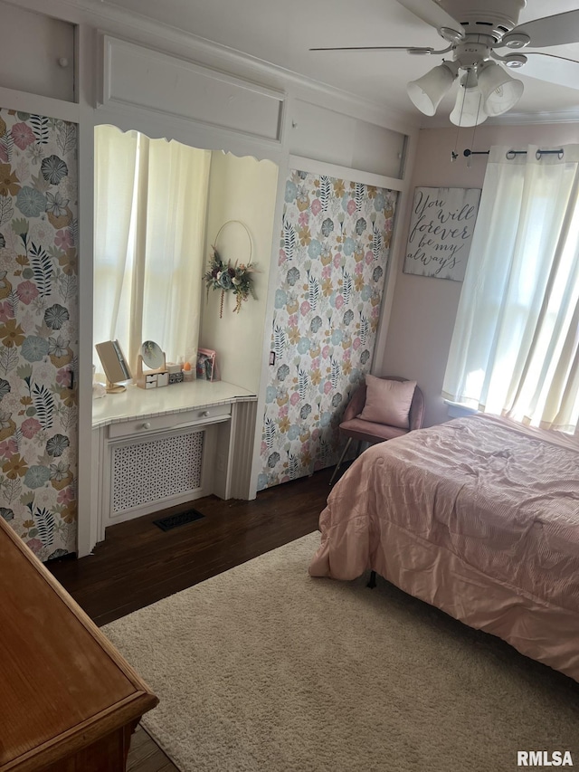 1037 Brown Ave, Galesburg, IL 61401 - bedroom featuring visible vents, a ceiling fan, radiator, and wood finished floors
