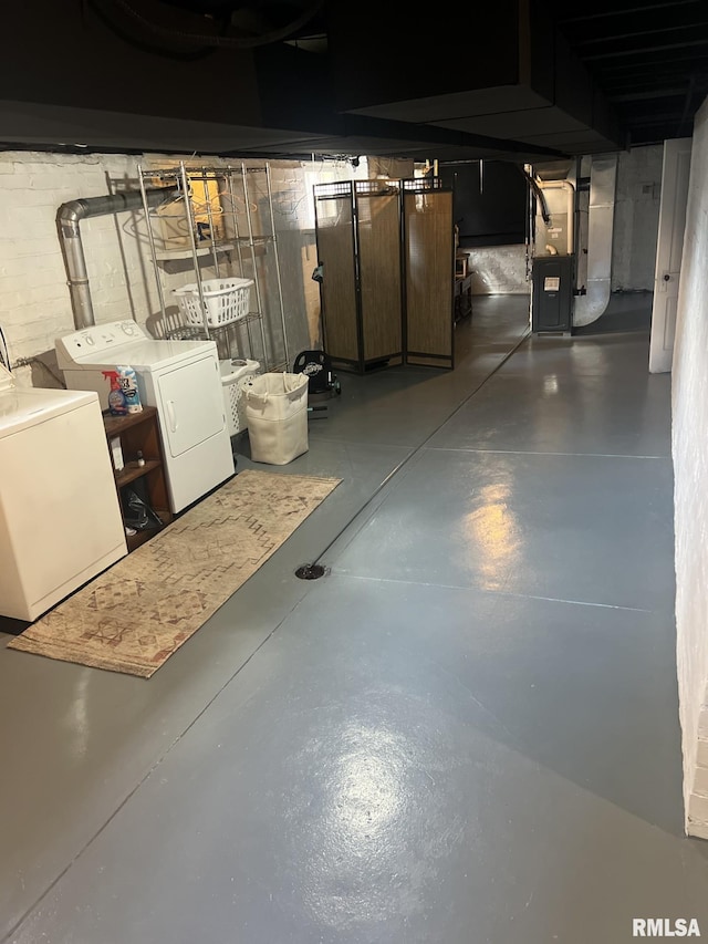 1037 Brown Ave, Galesburg, IL 61401 - unfinished basement with washing machine and clothes dryer and heating unit