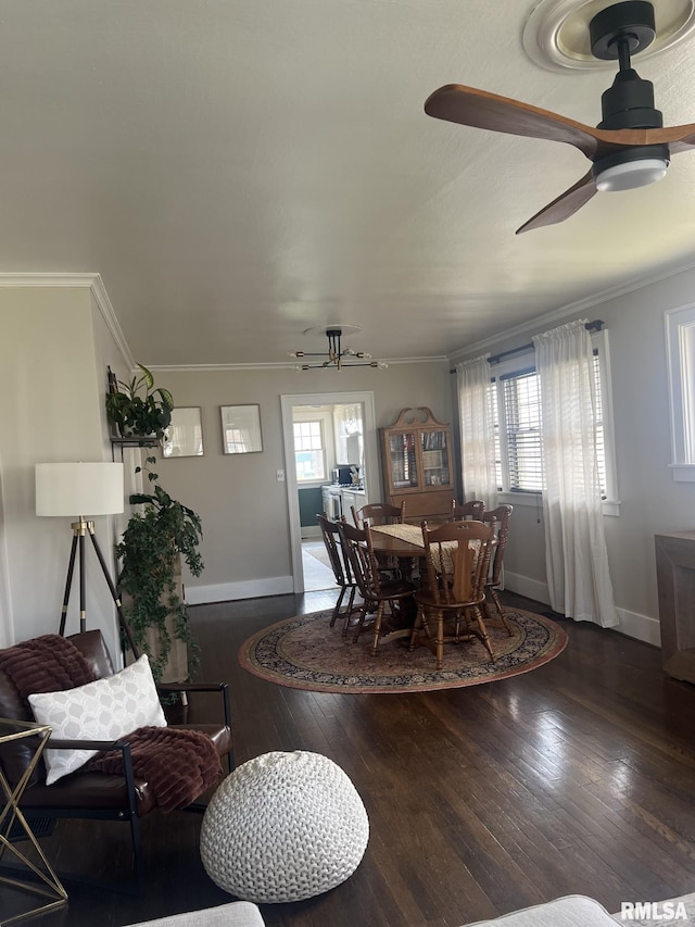 1037 Brown Ave, Galesburg, IL 61401 - dining space featuring a ceiling fan, ornamental molding, plenty of natural light, and hardwood / wood-style flooring