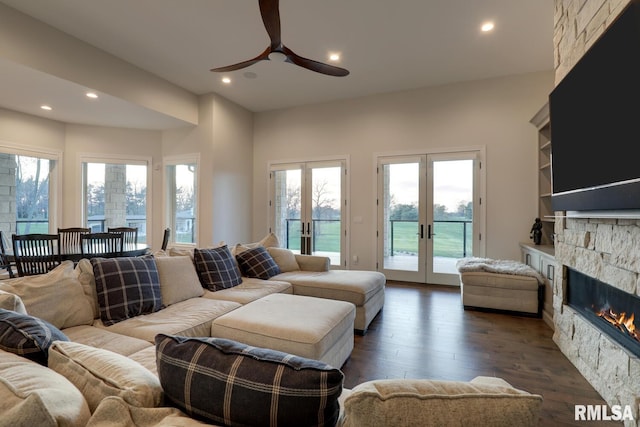 2300 Greenspointe Cir, Quincy, IL 62301 - living room with french doors, ceiling fan, dark wood-style flooring, recessed lighting, and a fireplace