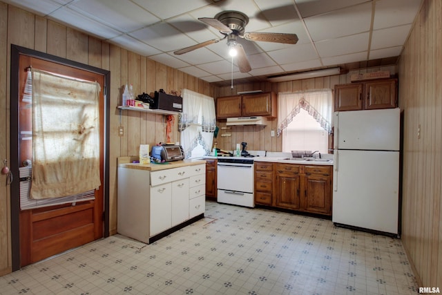 304 Chestnut St, Quincy, IL 62301 - kitchen featuring light countertops, ceiling fan, white appliances, under cabinet range hood, and light floors