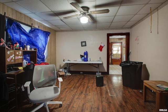304 Chestnut St, Quincy, IL 62301 - rec room with wood walls, ceiling fan, a drop ceiling, and wood finished floors