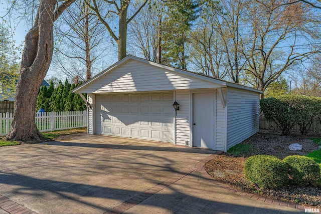 detached garage with fence