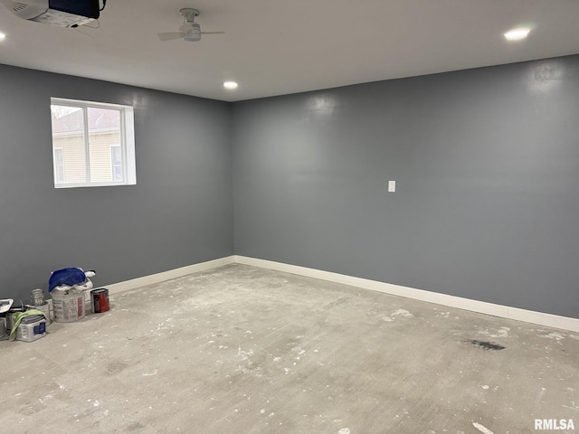 unfurnished room featuring baseboards and a ceiling fan