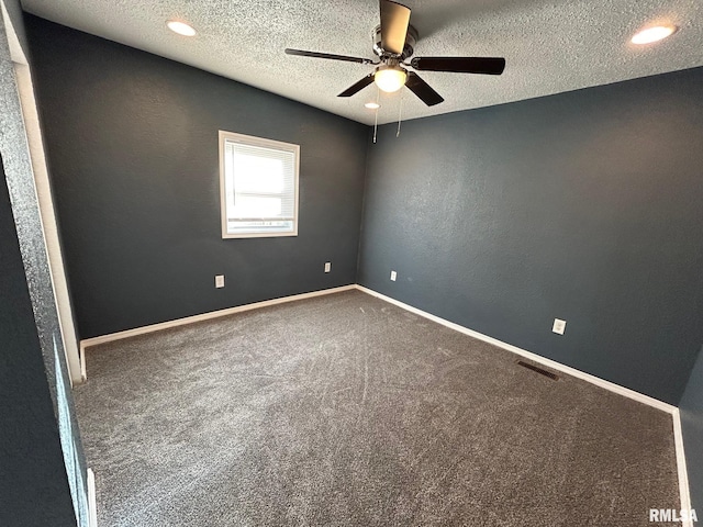 carpeted spare room featuring ceiling fan, a textured ceiling, visible vents, recessed lighting, and baseboards
