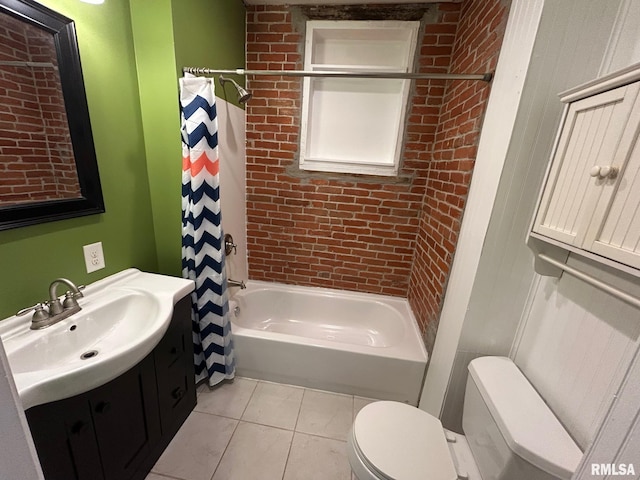 bathroom featuring toilet, shower / bathtub combination with curtain, vanity, and tile patterned flooring