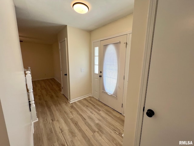 905 W Wind Rose Ln, Athens, IL 62613 - entrance foyer featuring light wood finished floors and baseboards