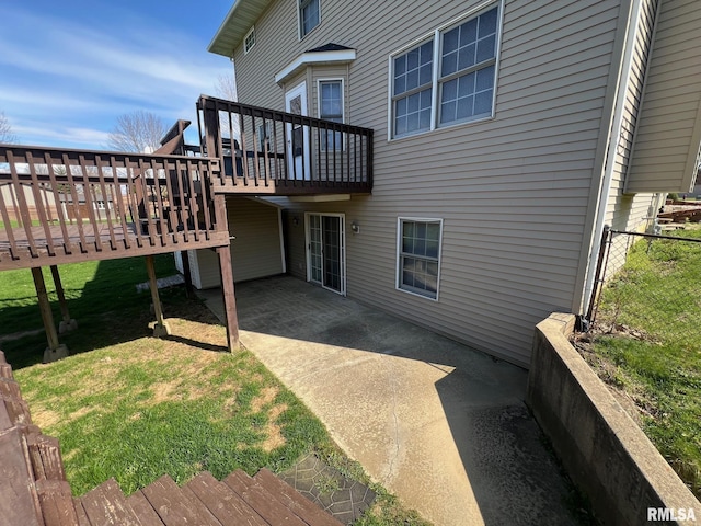 905 W Wind Rose Ln, Athens, IL 62613 - back of house with a wooden deck, fence, a patio area, and a lawn
