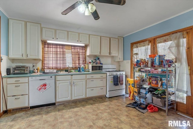 kitchen with white appliances, a ceiling fan, ornamental molding, a sink, and a toaster