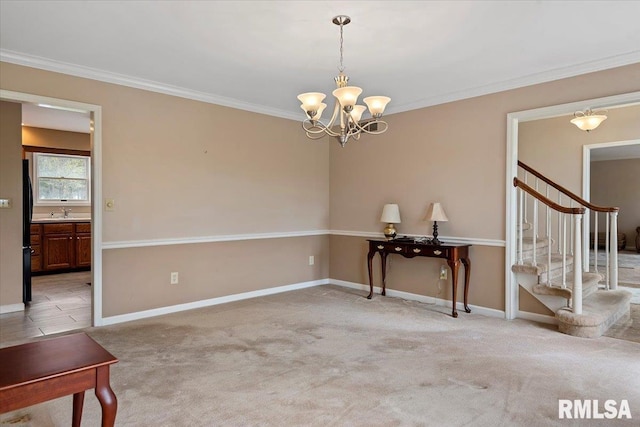interior space featuring crown molding, an inviting chandelier, baseboards, and stairs