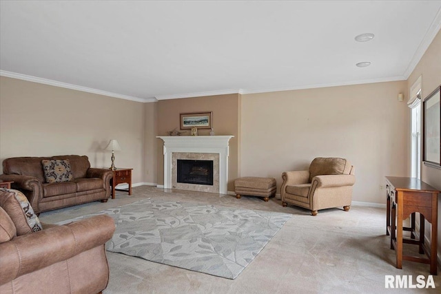 carpeted living room with crown molding, a fireplace, and baseboards