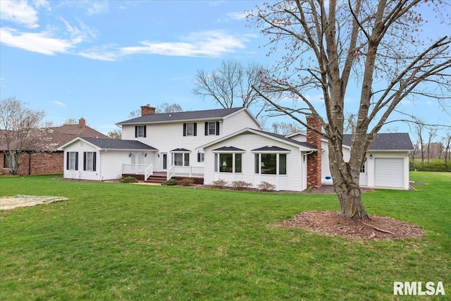 traditional-style house featuring a chimney, a wooden deck, and a front yard